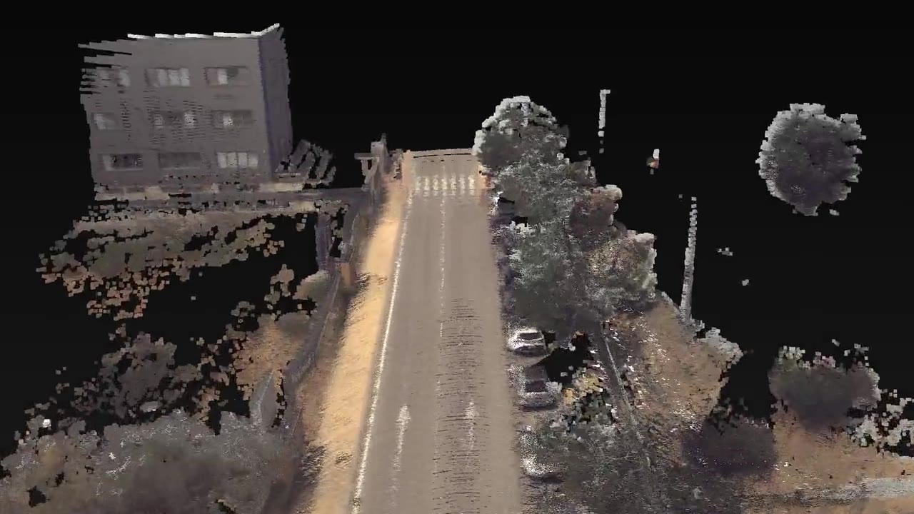Gemelo digital de una calle con edificios: nube de puntos a color capturada con LiDAR